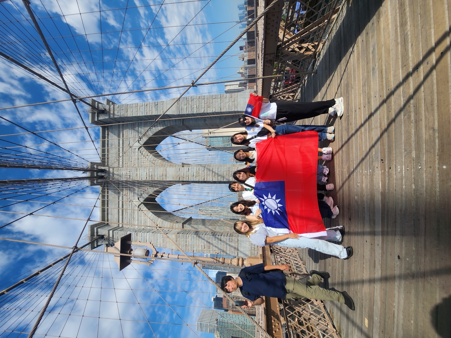 Taiwanese students waving Taiwan flag on Brooklyn Bridge